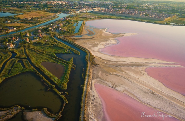 The pink salt pans and the coast near Aigues-Mortes from the air