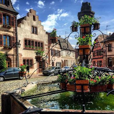 A fountain and timber-framed houses in Bergheim