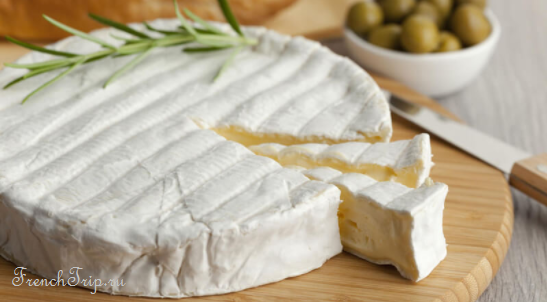 A wheel of brie cut open