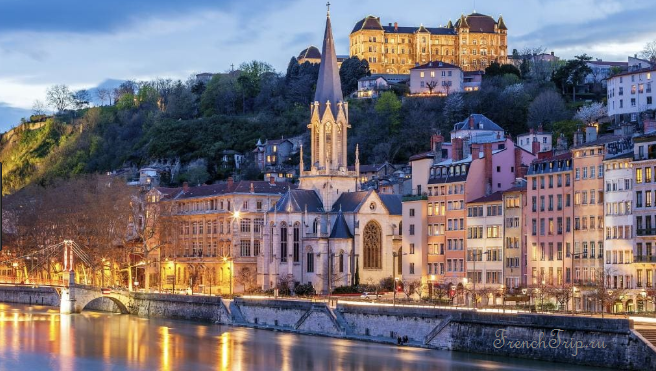 The Saone waterfront in Vieux Lyon in the evening, with the church of Saint-Georges