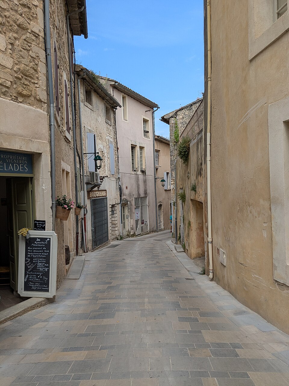 A quiet lane of stone houses in Ménerbes