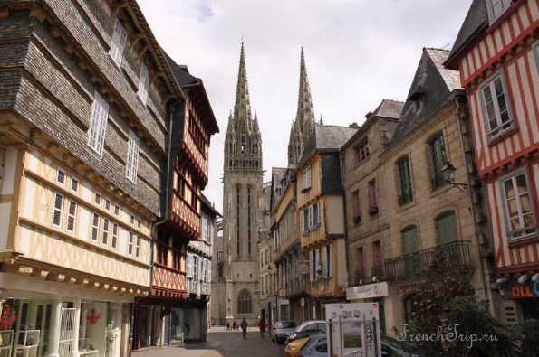 A street of timber-framed houses leading to the cathedral of Quimper
