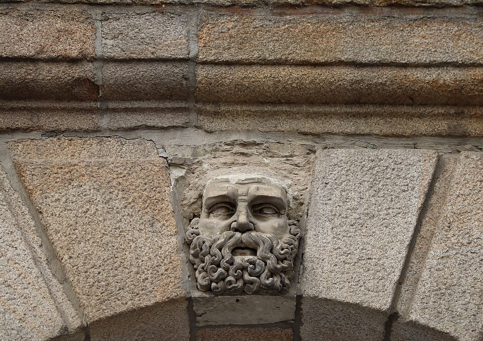 A carved mascaron on the Place du Parlement in Rennes