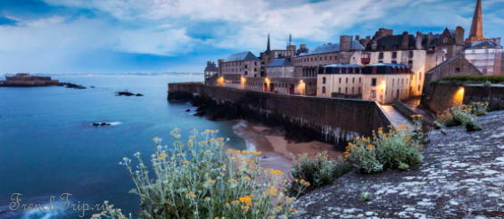 Saint-Malo at dusk seen across the beach