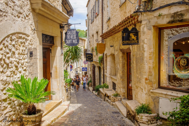 A cobbled lane in Saint-Paul-de-Vence lined with galleries and stone houses