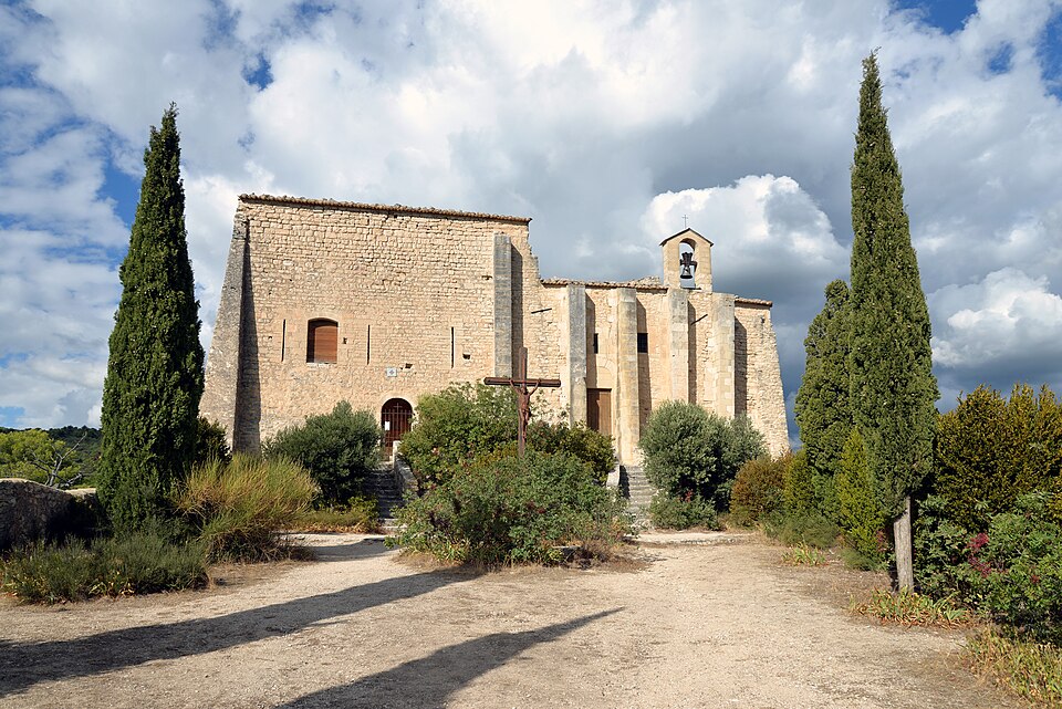 The church at Saint-Saturnin-les-Apt among cypresses