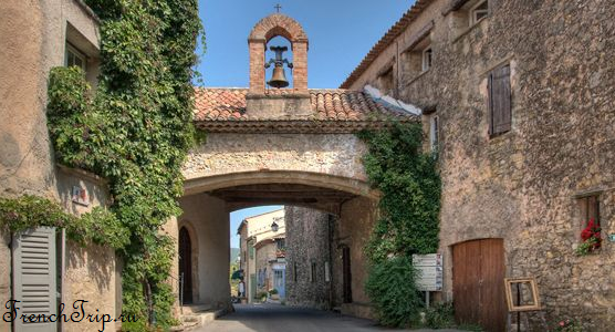 A vaulted gateway into the old village of Tourtour
