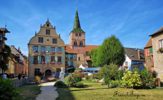 The main square of Turckheim with the town hall and church