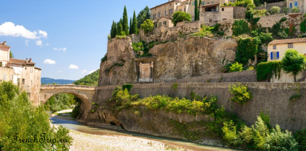 Stone houses of the upper town above the river at Vaison