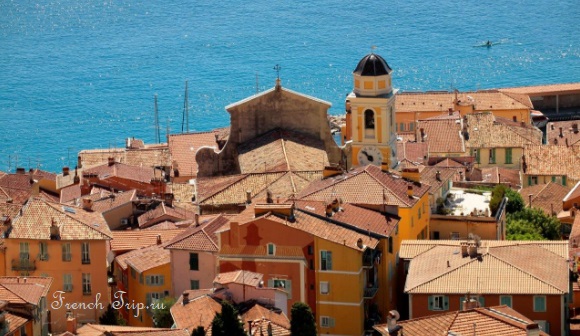 Ochre houses of the old town of Villefranche-sur-Mer above the harbour