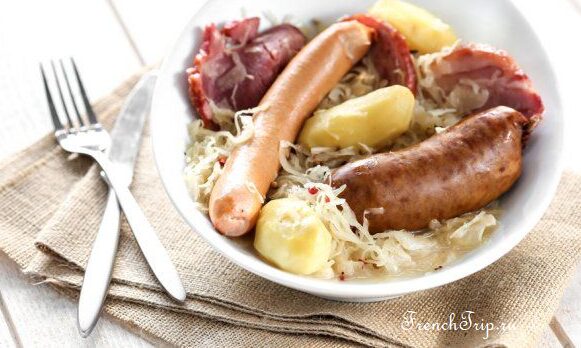 Sauerkraut served with smoked pork, sausages and potatoes