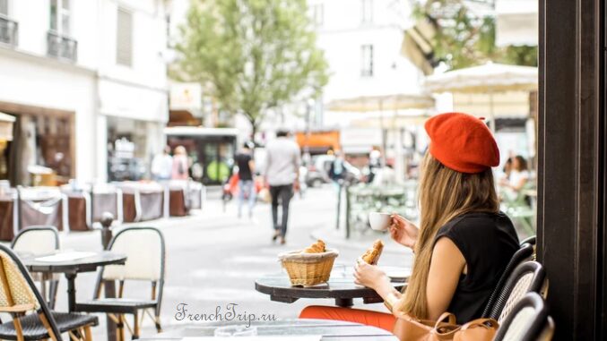 Breakfast served at a pavement cafe table in France