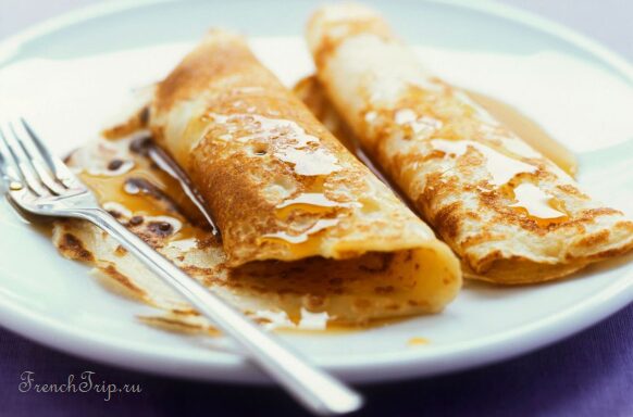 Thin wheat-flour crepes folded on a plate