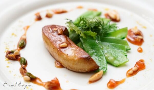 Pan-seared foie gras, served hot with fruit