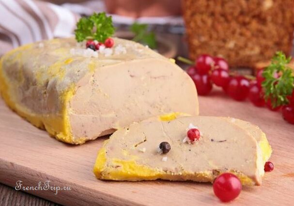 A terrine of foie gras sliced for serving